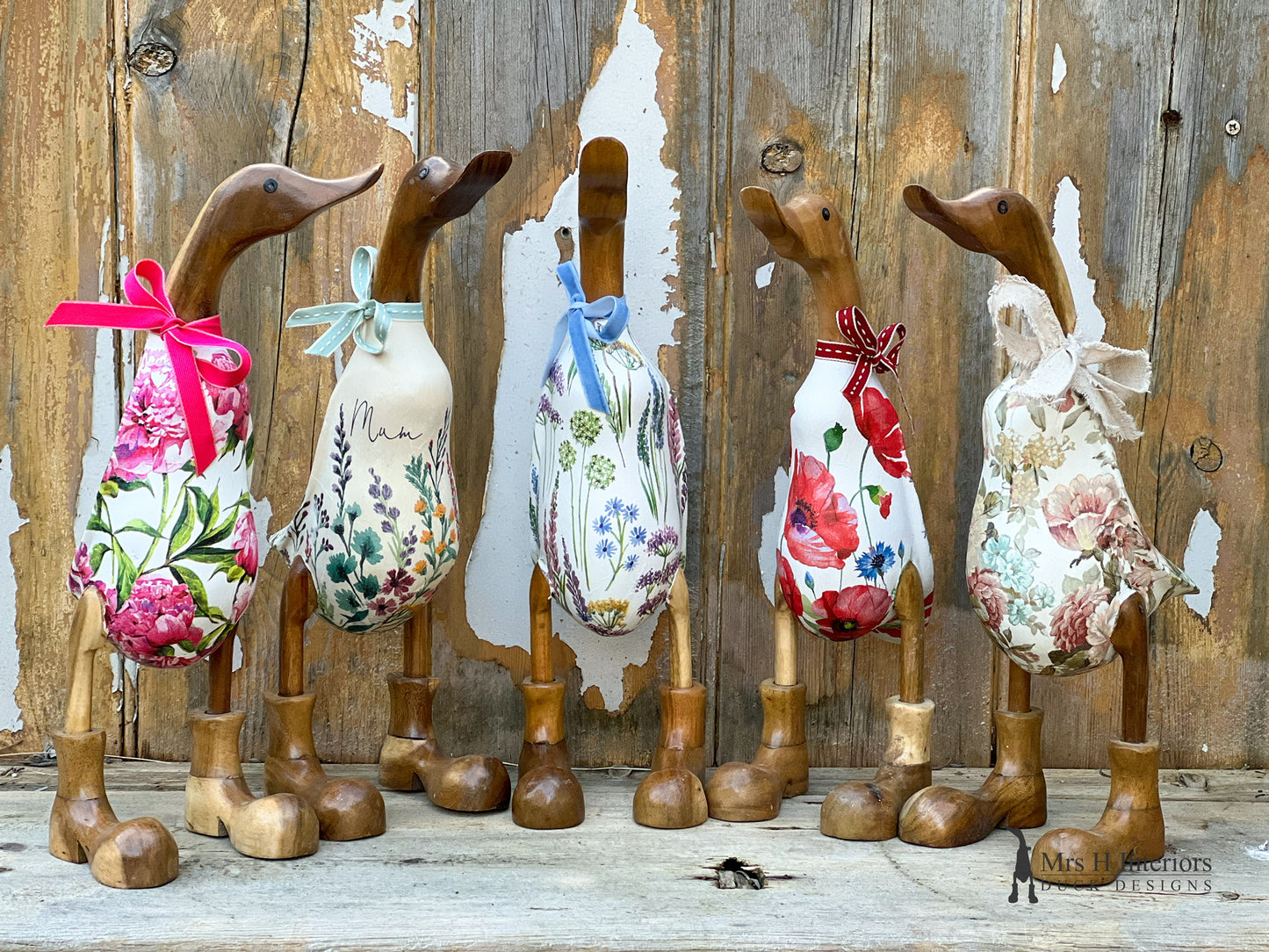 Devon - The hollyhocks and foxgloves decorated Wooden Duck in Boots by Mrs H the Duck Lady
